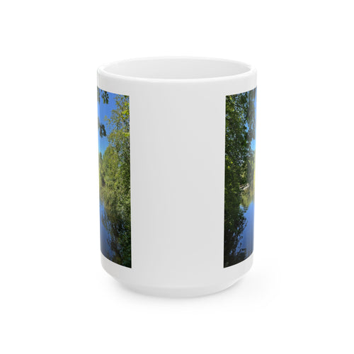 White ceramic coffee mug with landscape photo wrapped around the sides