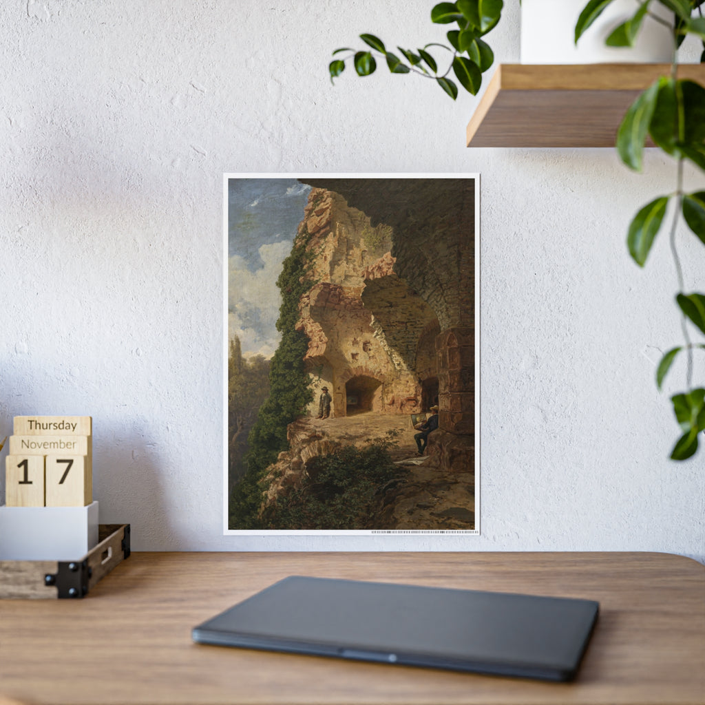 Framed landscape art print featuring cave-like ruins, greenery, and two small figures.