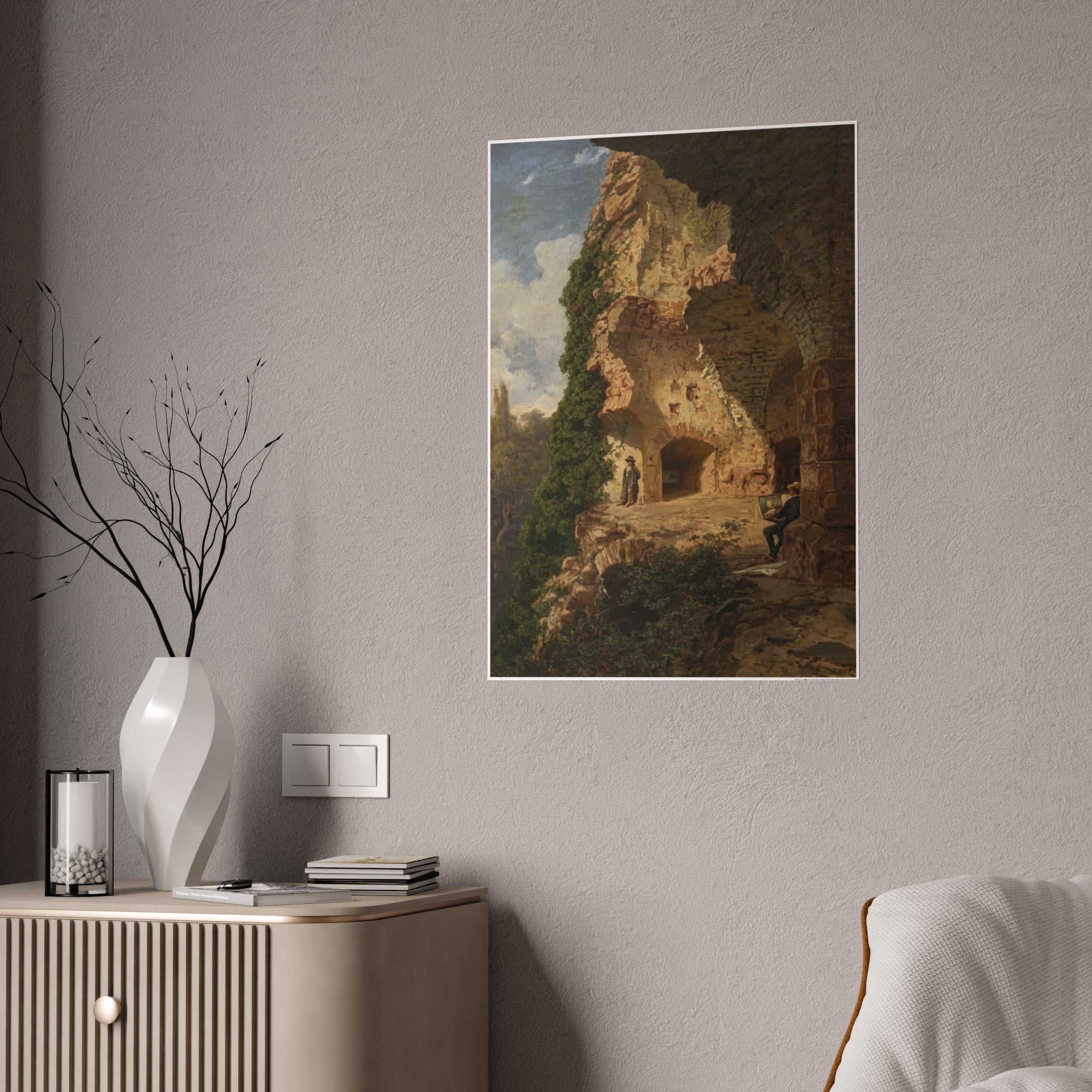 Framed landscape art print with rocky arches, vines, and small figures in a sunlit path.