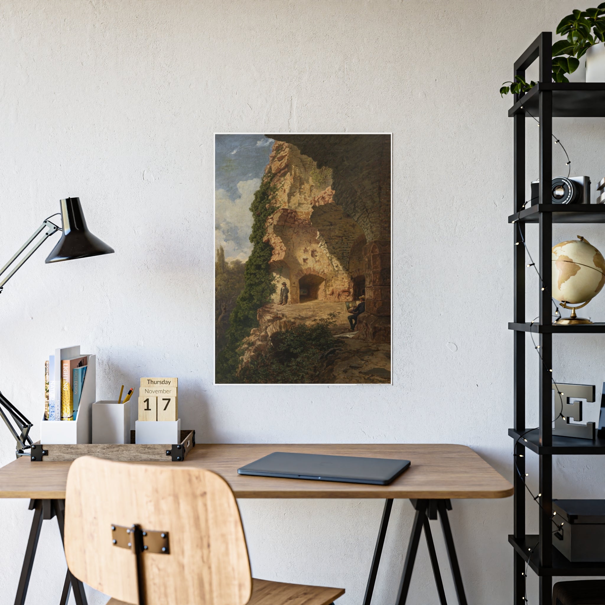 Framed landscape art print with crumbling rock formations, green trees, and distant figures.