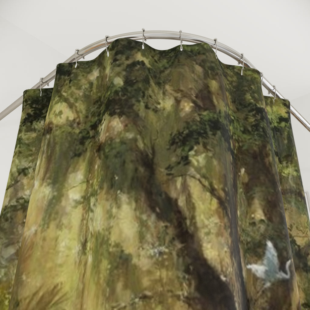 Shower curtain close-up with green tree and heron artwork and metal top grommets