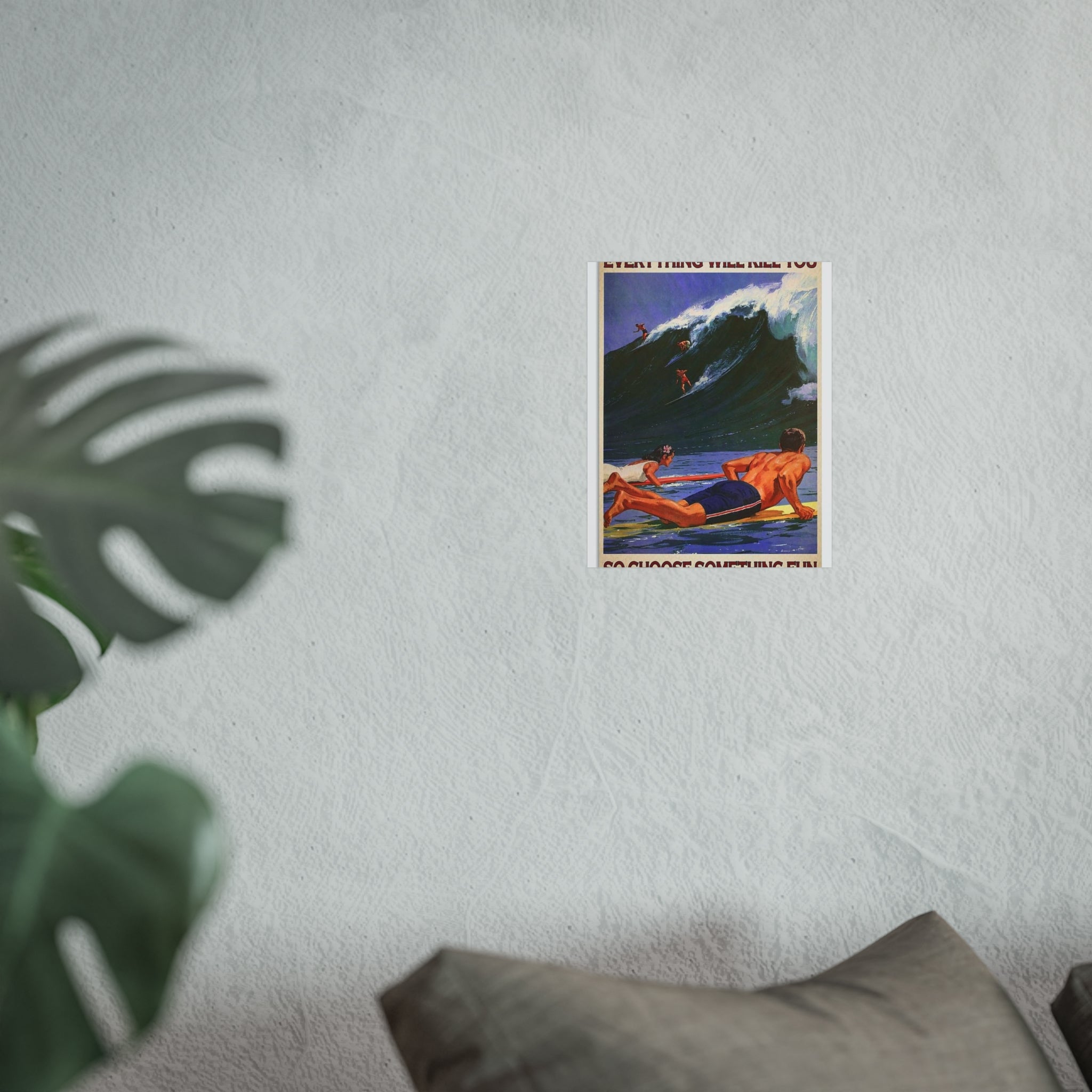 Framed wall poster with surf illustration and quote text, small on textured wall