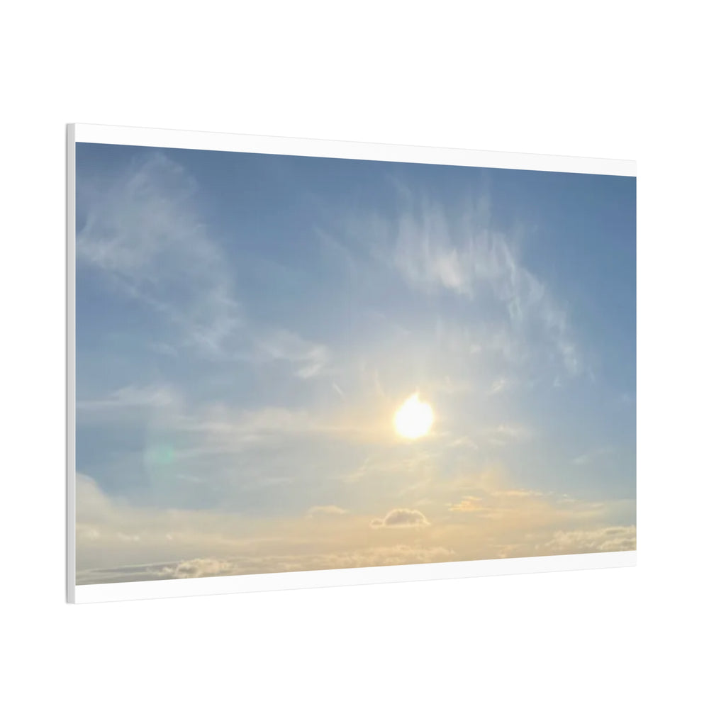 Landscape sunrise sky canvas print with glowing sun behind clouds, white frame