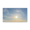 Rectangular canvas print of sunrise sky with glowing sun and soft clouds