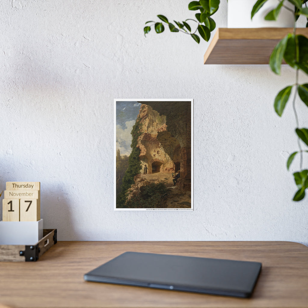 Framed landscape art print with rocky cave openings, vines, and small standing figures.